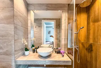 a bathroom with a sink and a shower at Walk to Markets from a Cozy Studio by Cielo Homes in Athens