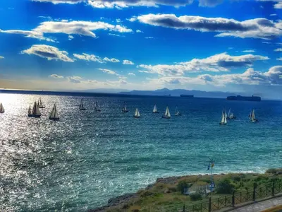 a group of sailboats on a large body of water at Seaview apartment in Piraeus