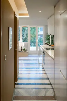 a kitchen with a blue and white tile floor at Auntie’s Home in Athens