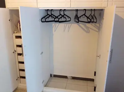 a room with a closet with wine racks at Renovated apartment in Athens