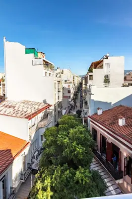 a view of a city street with buildings at Loft in Athens