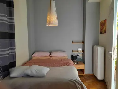 a bedroom with two beds with pillows on it at For Harbor Travelers in Piraeus