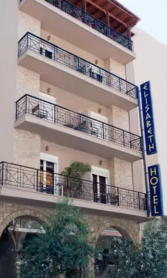 a building with balconies and a sign on it at Elizabeth Hotel in Athens
