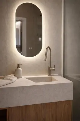 a bathroom with a sink and a mirror at Elegant Plaka Retreat by Liberty's Canvas in Athens