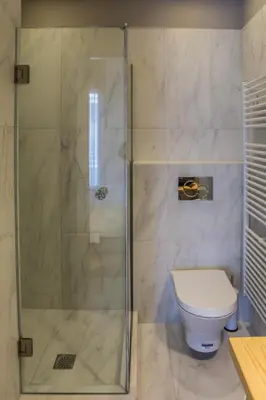 a bathroom with a shower and a toilet at Athens Life in Athens