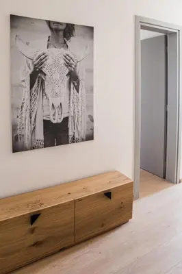 a room with a picture of a woman holding a shirt at Athens Life in Athens