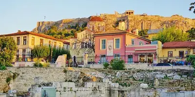 a group of buildings in front of a mountain at Athens beautiful SUITE by Gela in Athens