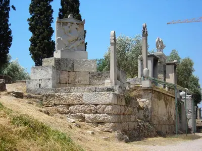 an old cemetery on the side of a hill at Urban Art Experience with Acropolis View in Athens