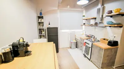 a small kitchen with a sink and a stove at D16 Athens Apartment - 5' mins to Petralona Metro in Athens