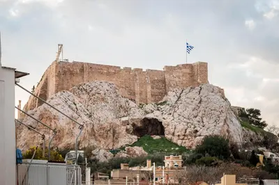 a castle on top of a mountain with a city at Martin’s Akropolis loft in Athens