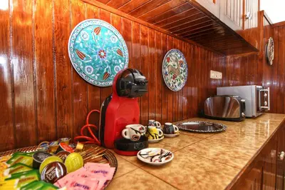 a kitchen counter with a red appliance on a counter top at Athens Authentic Elegance at Acropolis in Athens
