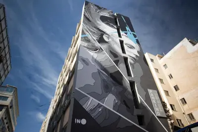 a mural on the side of a building at Filon in Piraeus