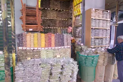 a man standing in a store with a lot of baskets at Acropolis View Apartment in Central Athens! SQ1 in Athens