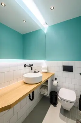 a bathroom with a sink and a toilet at Mosaikon in Athens