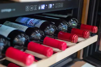 a bunch of wine bottles on a wine rack at B4B Athens Signature Hotel in Athens