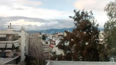 a view of a city with buildings at Theo's loft in Athens