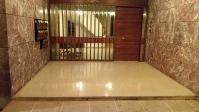 an empty hallway with a gate in a building at Theo's loft in Athens