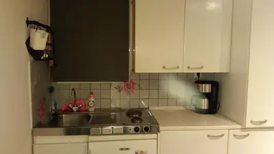 a kitchen with a sink and a counter top at Theo's loft in Athens