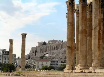 a group of columns with a hill in the background at Wonderful Apartment in central Athens in Athens