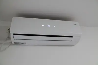 a white computer printer sitting on top of a table at The New Studio Suite Near Akropolis in Athens