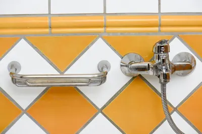a bathroom sink with a shower faucet at A Diamond of 140 m2 in Platonas Ancient Athens in Athens