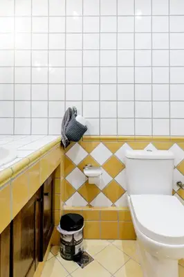 a bathroom with a toilet and a sink at A Diamond of 140 m2 in Platonas Ancient Athens in Athens