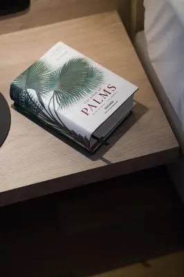 a book sitting on top of a table at Stylish and Spacious 2BD - Thiseio by UPSTREET in Athens