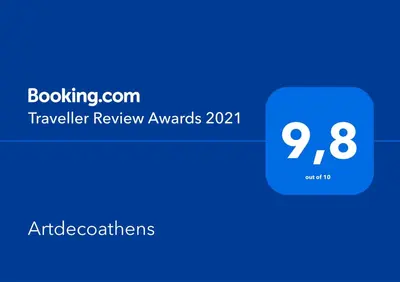a blue box with the text traveler review awards on it at Artdecoathens in Athens
