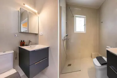 a bathroom with a toilet and a sink and a shower at Seaside Secret by BluPine in Athens