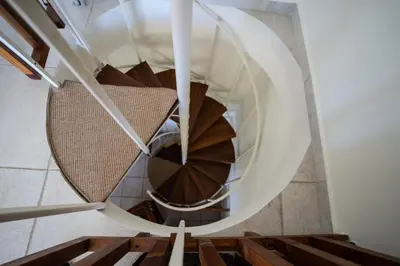 a spiral staircase in a building at Apollo complex 1 in Porto Rafti