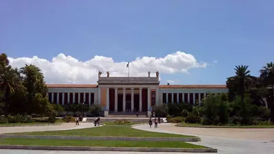 a large building with people walking in front of it at Blue Ark Stylish Athens in Athens