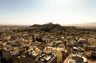 a view of a city with a castle on a hill at Athens heart, Syntagma metro studio in Athens