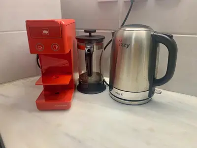 a coffee maker and a blender on a counter at Truman Apartment - Athens in Athens
