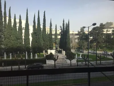 a view of a park with a bunch of trees at Truman Apartment - Athens in Athens