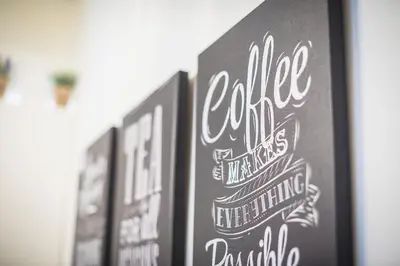 a chalkboard with a sign that says polka dots at Athenz Downtown Studio in Athens