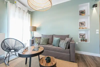 a living room with a couch and a table at 