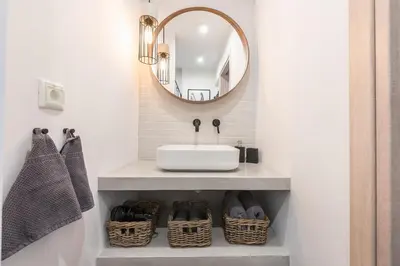 a bathroom with a sink and a mirror at 