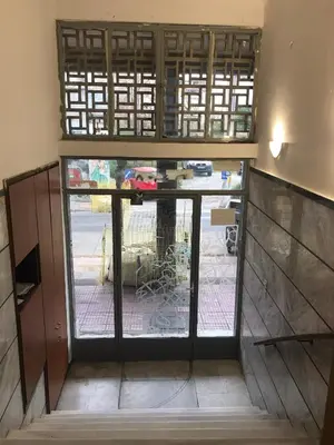 an entrance to a room with a door with a gate at 