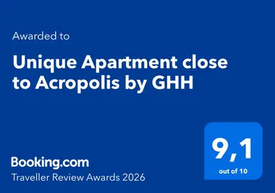 a blue sign with the words unique appointment close to apopsychos bycham at Unique Apartment close to Acropolis by GHH in Athens