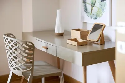 a desk with a mirror and a chair at Grystal Green Properites in Athens