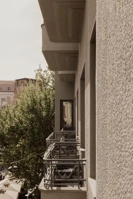 a balcony on the side of a building at Perianth Hotel, a Member of Design Hotels in Athens