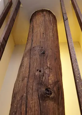 a wooden beam on the ceiling of a room at me gusta suite by the sea in Anavissos