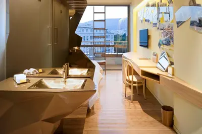 a bathroom with a sink and a large window at New Hotel in Athens