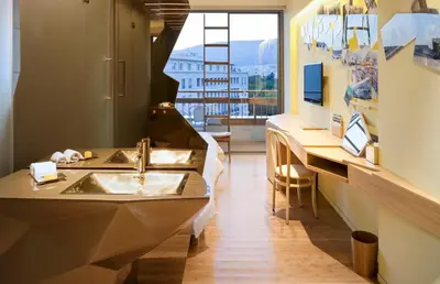a bathroom with a sink and a large window at New Hotel in Athens