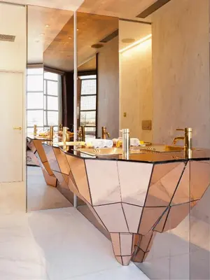 a glass table in a room with a mirror at New Hotel in Athens