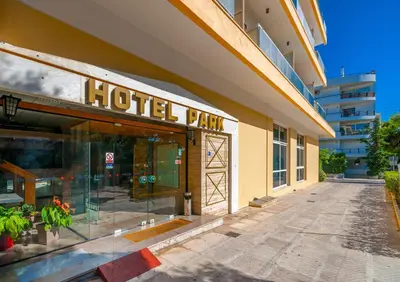 a hotel sign on the side of a building at Park Hotel in Athens