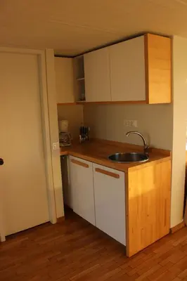 a kitchen with a sink and a counter top at Acropolis view penthouse in Athens