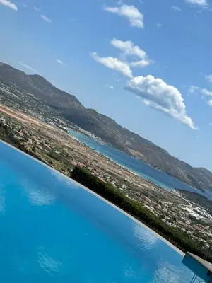 an aerial view of a beach and the water at Endless Blue in Anavissos