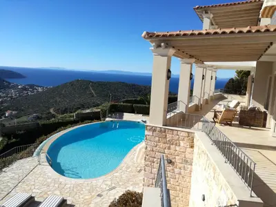 a swimming pool in a villa with a view at Endless Blue in Anavissos