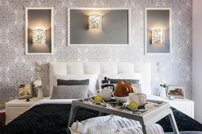 a bedroom with a bed with a tray of food on it at Museum of Modern Art Rooms in apartment, next to metro Suggrou Fix, walk to Acropolis in Athens
